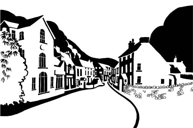 Black and white image of houses between two hills